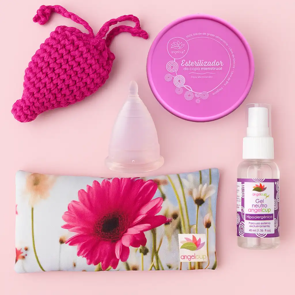Soluciones Angelcup: copa menstrual, gel neutro, vaso esterilizador, cojín anticólicos y bolsita Colors para un ciclo armónico.