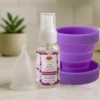 copa menstrual con vaso y gel en baño